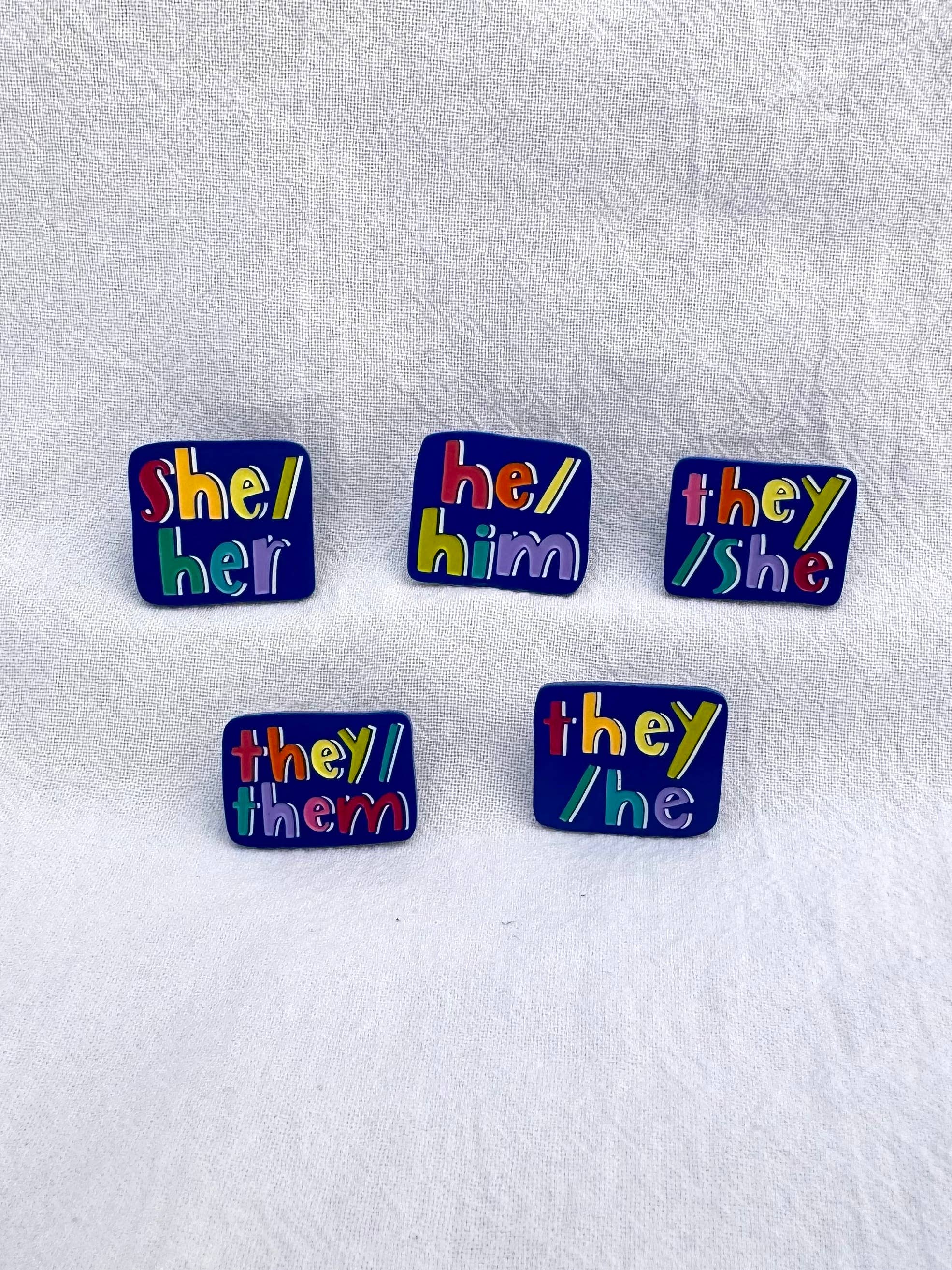 Blue & Rainbow 1-inch pronoun pins!