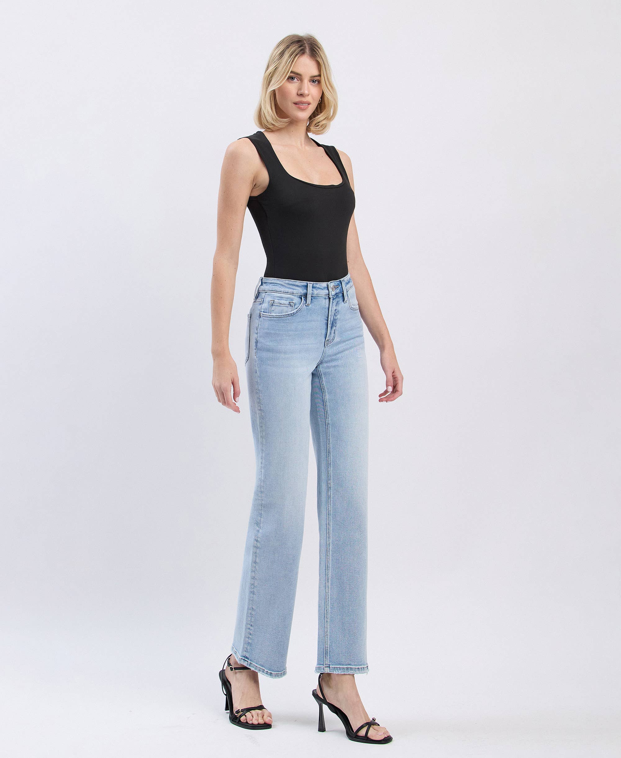 High Rise Light Wash Slim Wide Leg Jeans